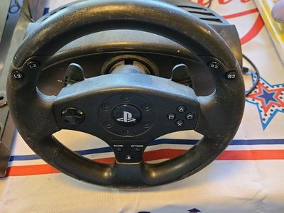 Thrustmaster T300 or similar