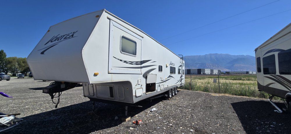 Used Vortex Travel Trailer Toy Hauler - Ready for Adventure with Cargo Space