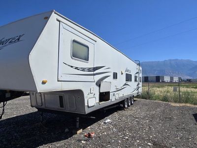 Used Vortex Travel Trailer Toy Hauler - Ready for Adventure with Cargo Space