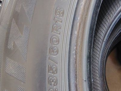 Bridgestone Blizzak DM-V2 235/60R18 107S Winter Tires (Set of 4) for SUV/Truck