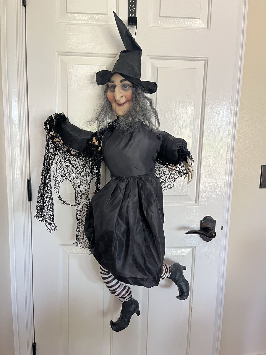 Halloween flying witch! Can be hung up and is 4 foot tall.