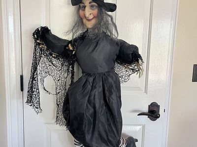 Halloween flying witch! Can be hung up and is 4 foot tall.