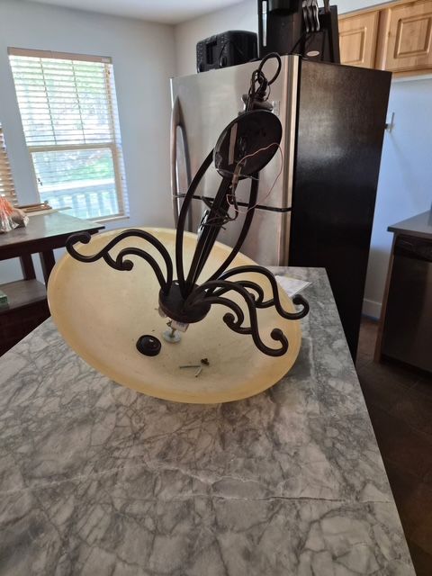 Antique bronze chandelier and island light