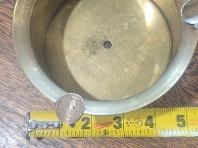 Vintage Brass Ashtray with Philippine Commonwealth Coin Accents - 4.5" Diameter. Its very heavy cam from a colonel.