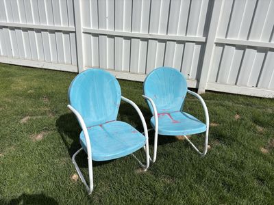 Pair of vintage metal patio chairs