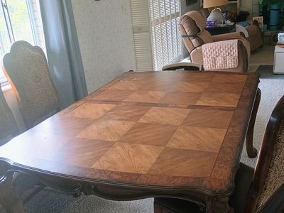 Wood table with four chairs