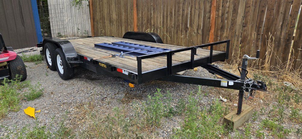 7x16 big bubbas Utility Trailer, Dual Axle, Wood Deck, with Ramps.