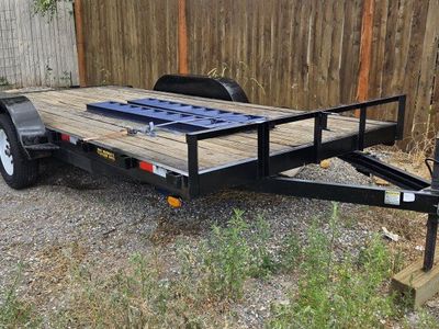 7x16 big bubbas Utility Trailer, Dual Axle, Wood Deck, with Ramps.