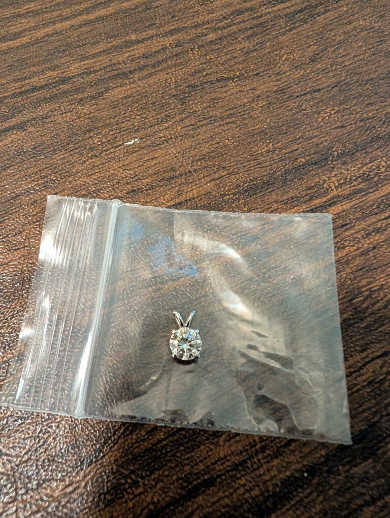 2 k moisanite stone set in .925 Sterling Silver