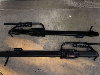 2 RockyMounts Roof Mount Bike - fits all roof rack systems.