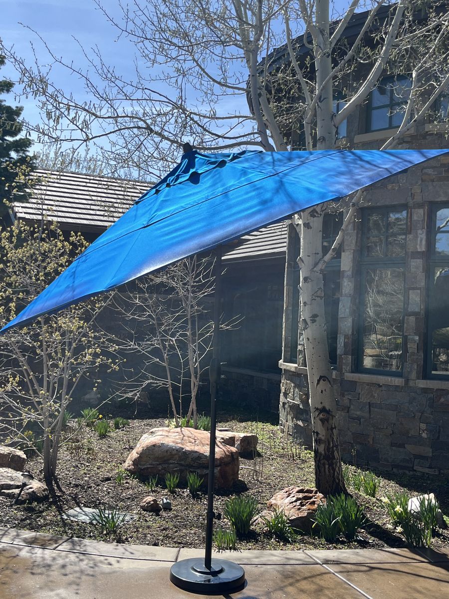 Treasure garden 11' auto tilt market umbrella with black pole and weighted base