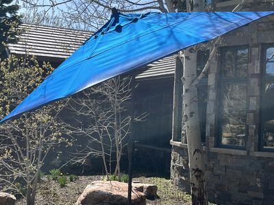 Treasure garden 11' auto tilt market umbrella with black pole and weighted base