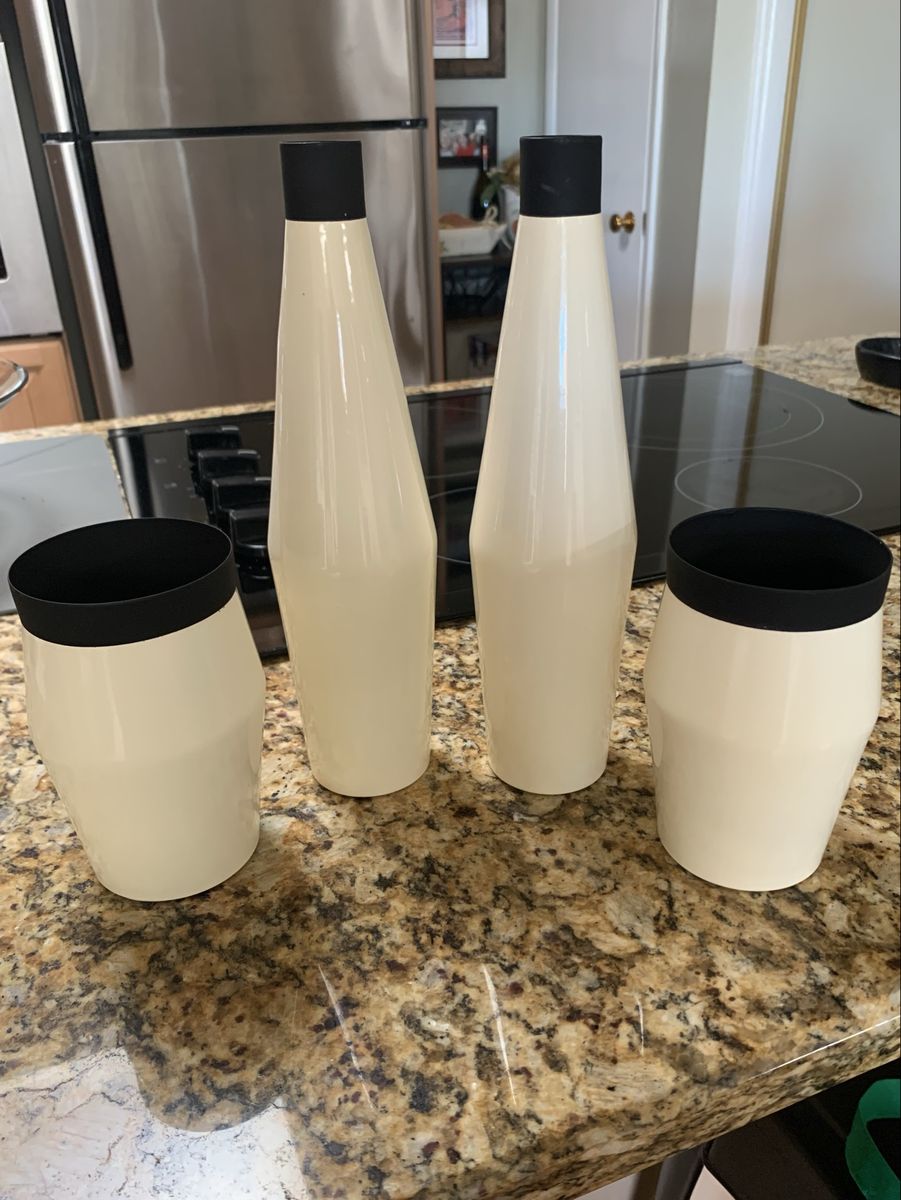 4 Decorative Cream and Black Metal Vases or Decor.