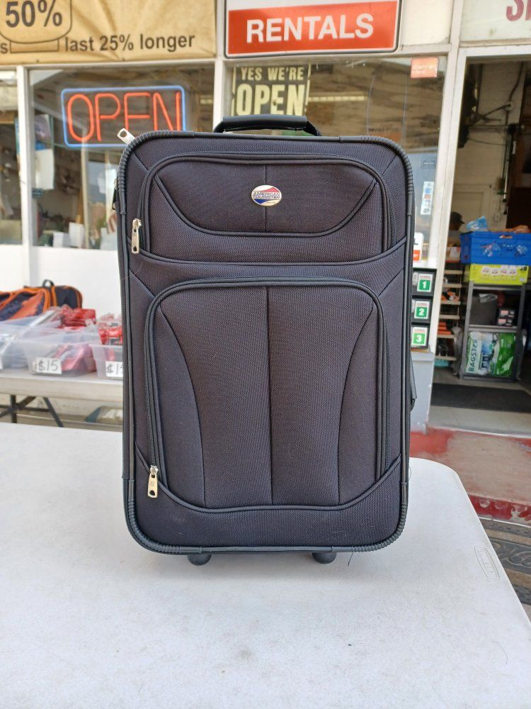 American Tourister Black 21 inch Softside Rolling Suitcase Luggage