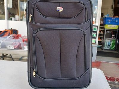 American Tourister Black 21 inch Softside Rolling Suitcase Luggage