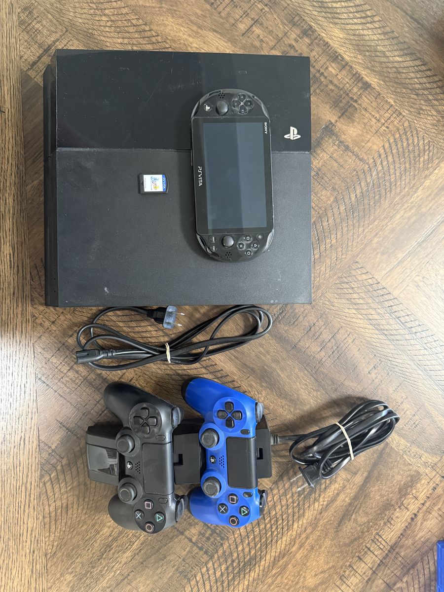 Playstation 4 with games and PSVita with game