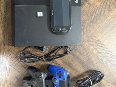 Playstation 4 with games and PSVita with game