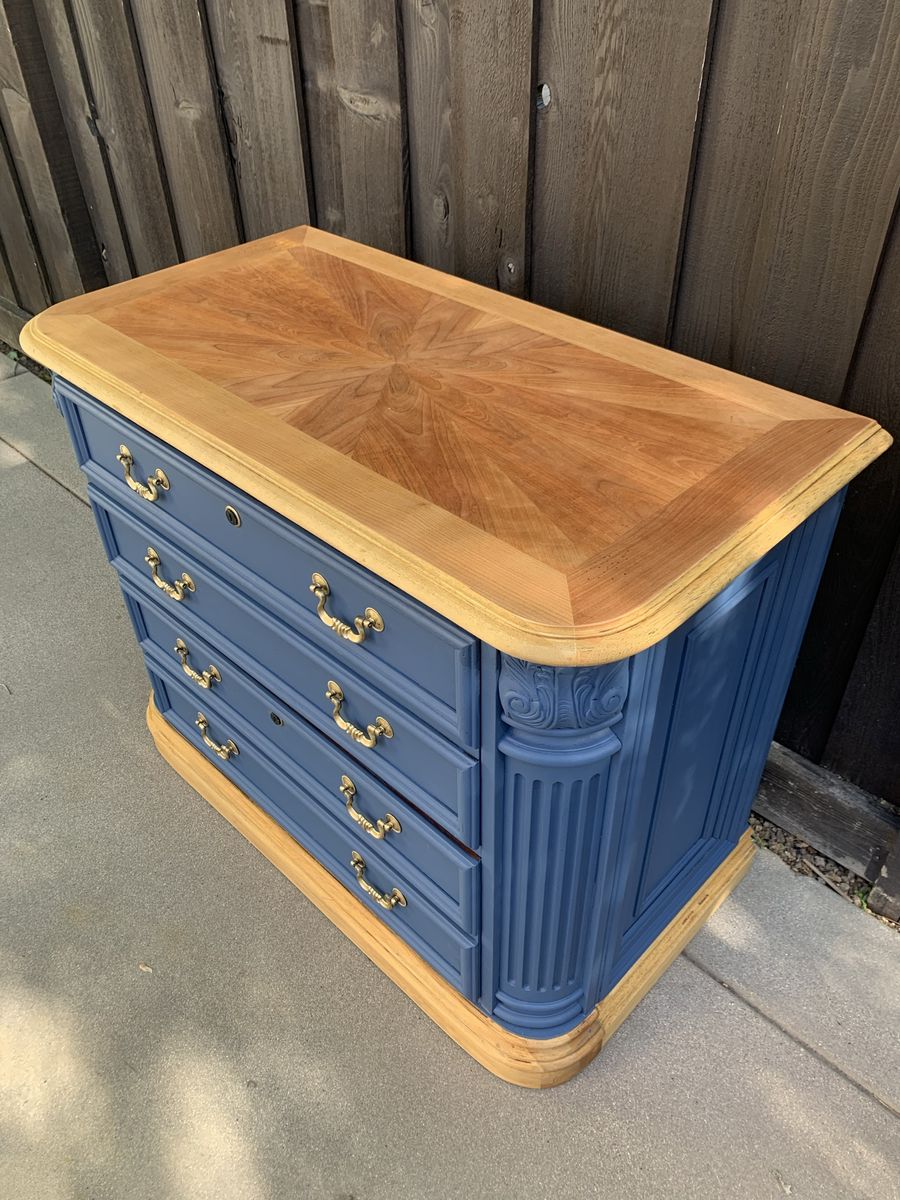 Blue dresser with starburst top