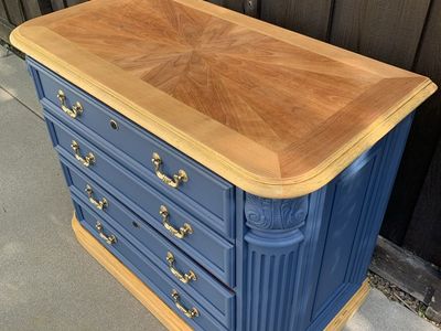 Blue dresser with starburst top