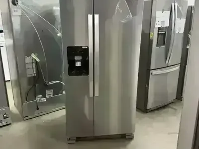 NEW WHIRLPOOL 33 INCH WIDE STAINLESS SIDE BY SIDE
