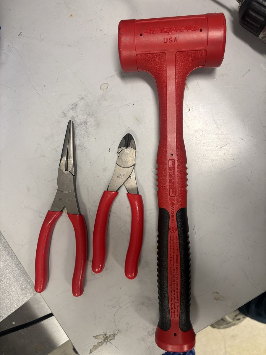 Snap on. Pliers, wire cutters and mallet