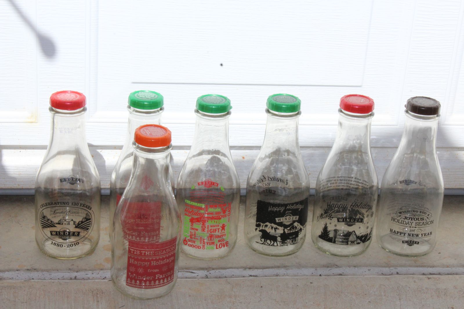 Winder dairy holiday glass quart bottles