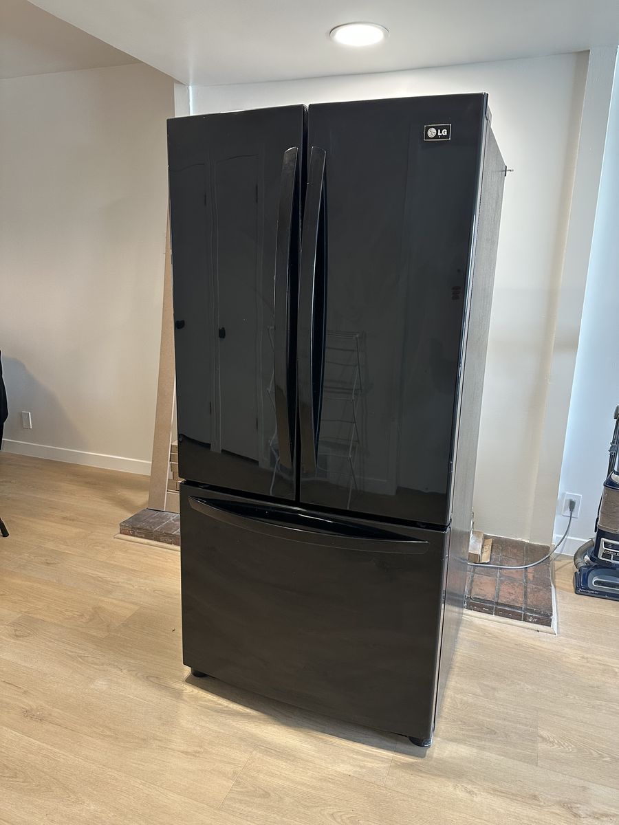Black StainlessLG Refrigerator in working condition