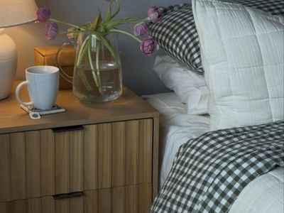 Wooden 2-Drawer Nightstand with Textured Front Panels, Light Wood Finish