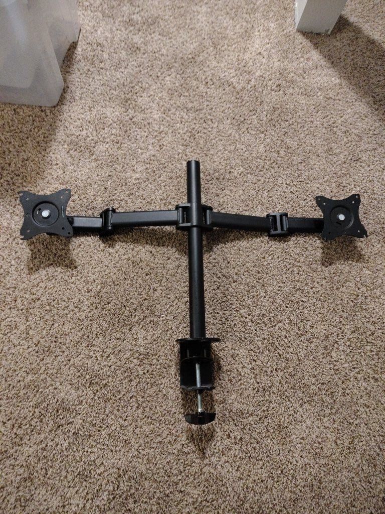 Dual monitor mount bracket adjustable