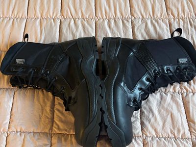 11.+5 us army boots size 11” slip and water resistant black leather and ideal for work wit zipper on the side 60.00 cash