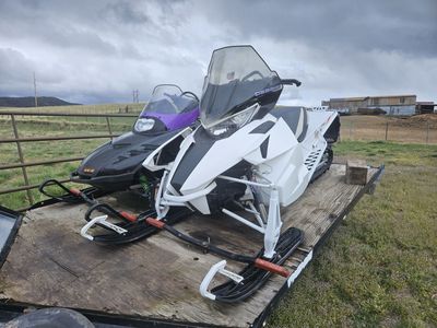 Two 2-Stroke Sleds & a Trailer