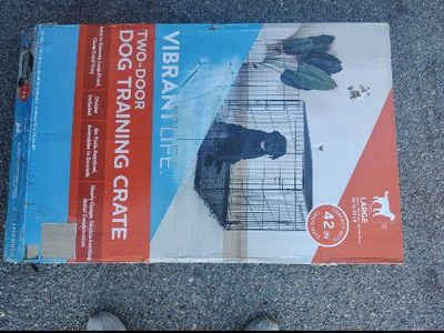 Vibrant Life Two-Door Dog Training Crate.
42 inches in length, suitable for dogs up to 90 pou