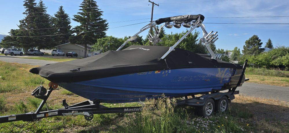 MasterCraft X-45 Wakeboard Boat (Blue/Black) with Trailer - Excellent Condition