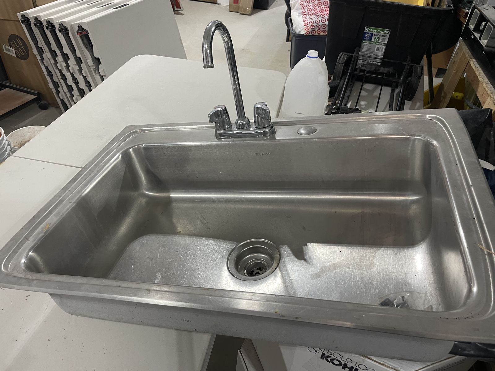 Stainless steel sink with faucet