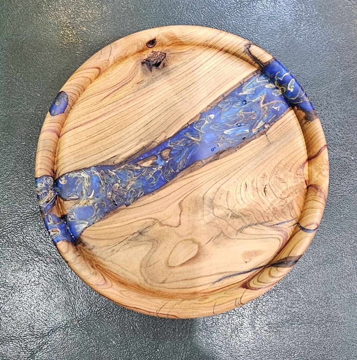 100 year old Lilac and epoxy base.