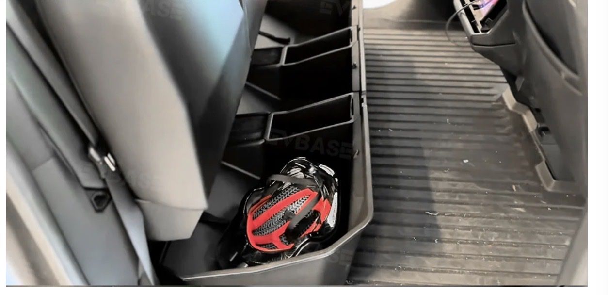Tesla cybertruck under rear seat storage bins