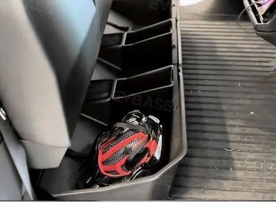 Tesla cybertruck under rear seat storage bins