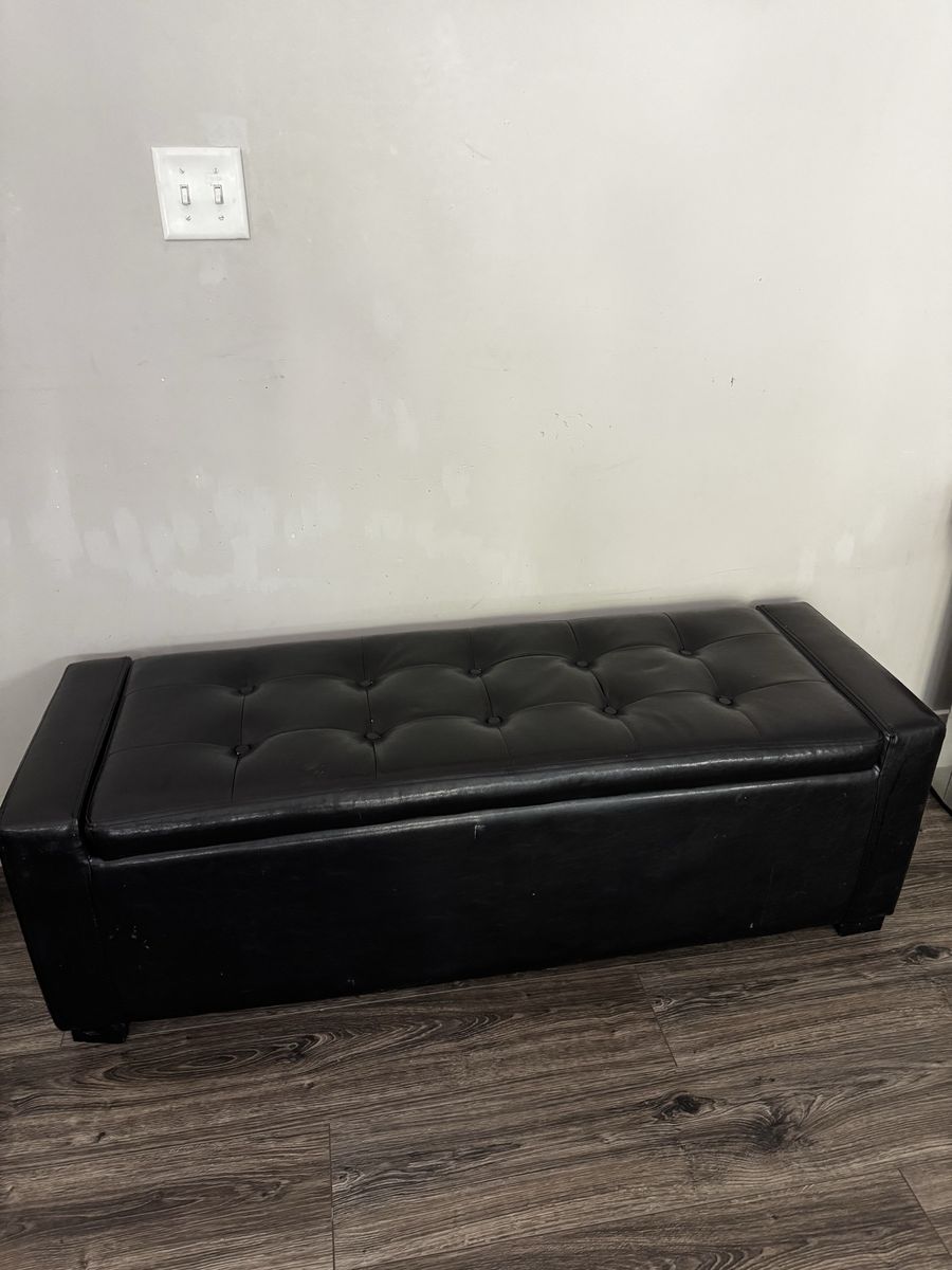 FREE Storage ottoman (black faux leather)