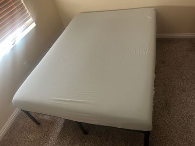 Like new, barely used, full size mattress and frame