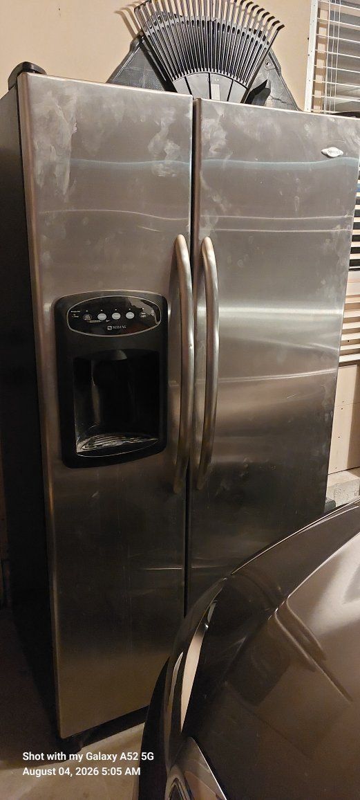 Maytag Side-by-Side Stainless Steel Refrigerator and Freezer with Water Dispenser