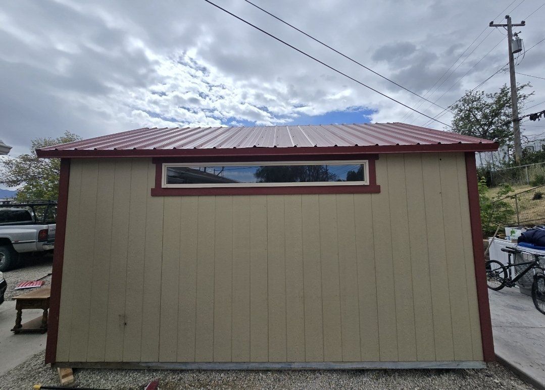 Custom Built Shed - Tan with Red Trim, Durable Metal Roof, Window and Door