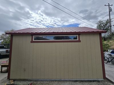 Custom Built Shed - Tan with Red Trim, Durable Metal Roof, Window and Door