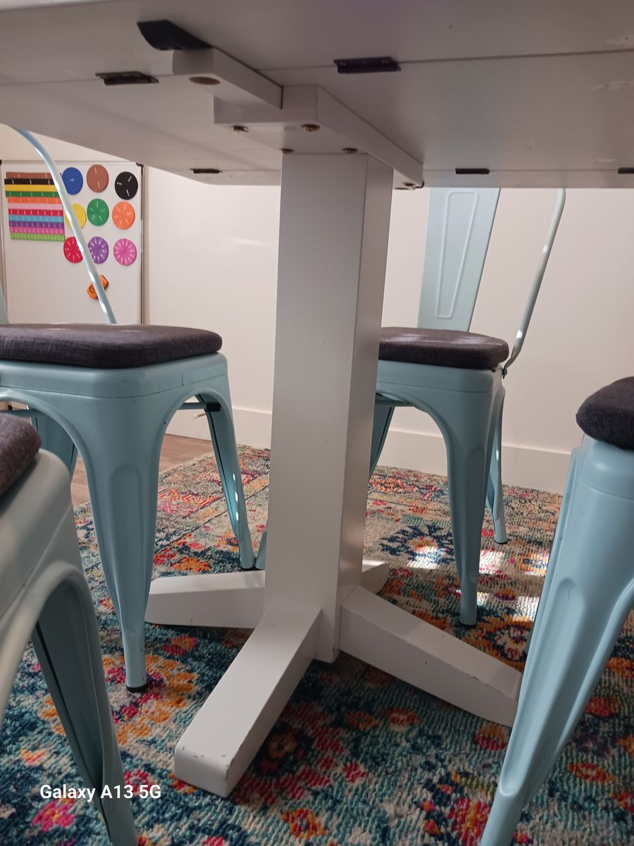 White table and 4 Aqua colored chairs