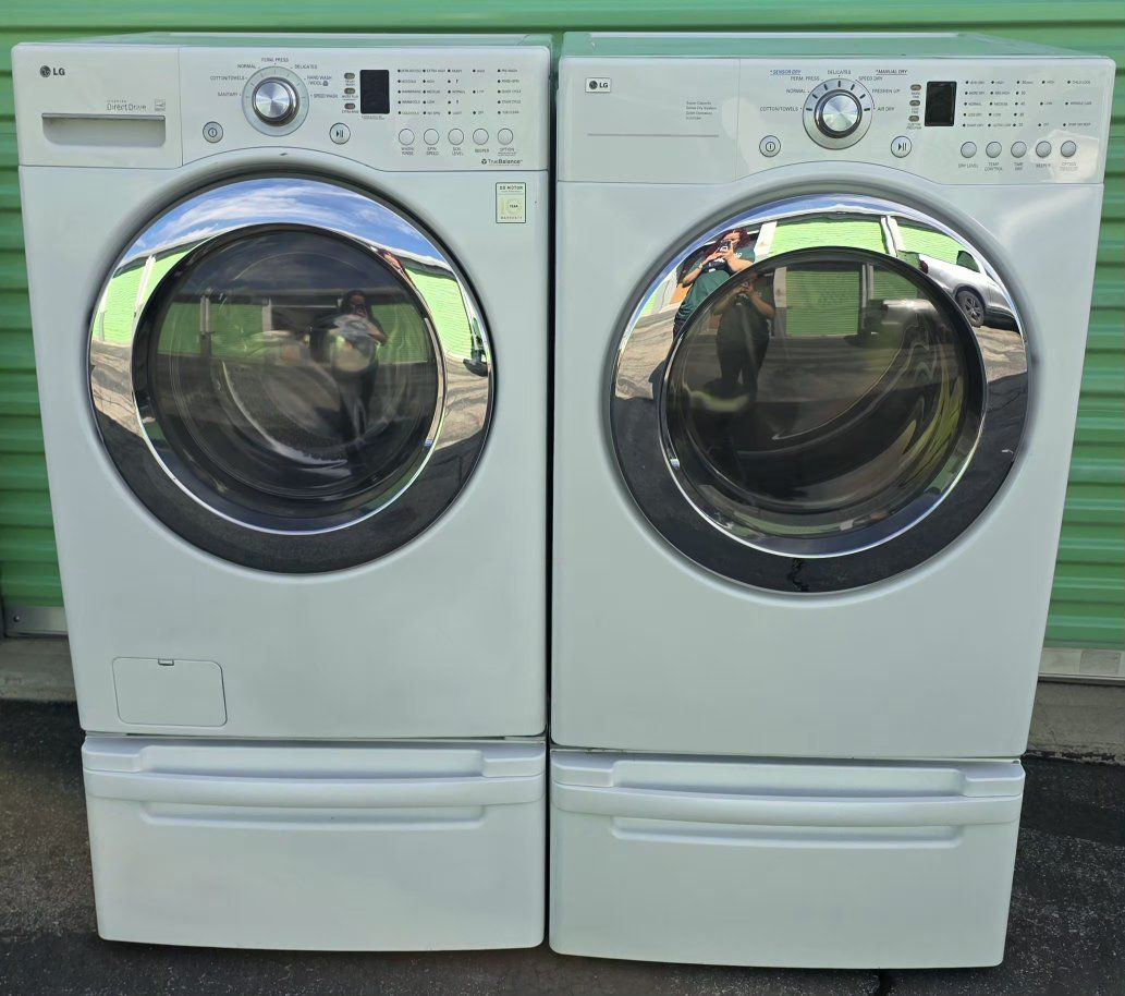 Beautiful LG frontload washer and electric dryer set with pedestals free curbside delivery is available in the slc area