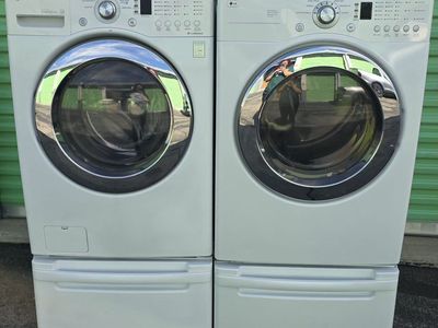 Beautiful LG frontload washer and electric dryer set with pedestals free curbside delivery is available in the slc area