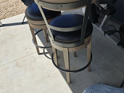 2 like new tall swivel bar stool