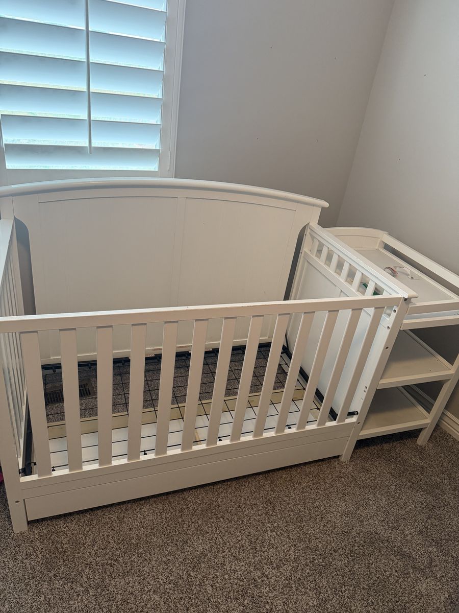Free Crib with changing table.