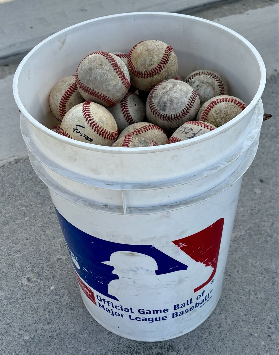 Bucket of 74 leather baseballs