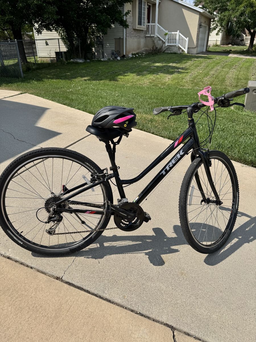 Trek Verve 3 Step-Thru Hybrid Bike with Helmet, Air Pump, and Water Bottle Cage