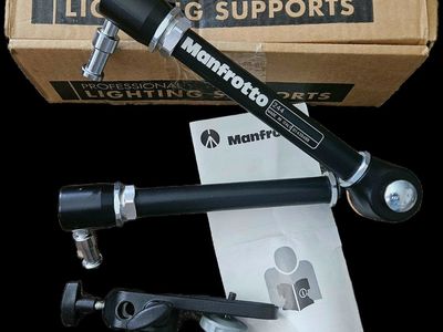 Manfrotto 244 Magic Arm and Camera Clamp Kit.